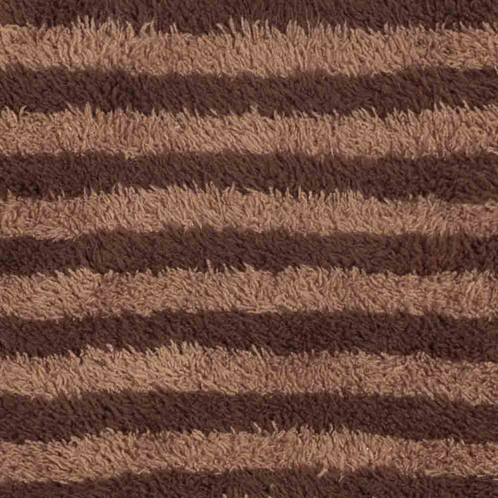 Close-up of brown striped fabric texture