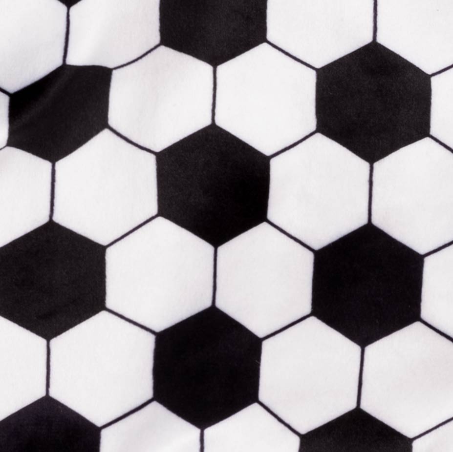 Black and white hexagon soccer pattern detail on cozy dog pajamas fabric