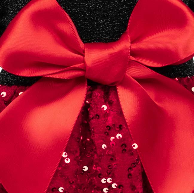 Shiny red bow and sequin skirt details from a glamorous holiday dog dress.