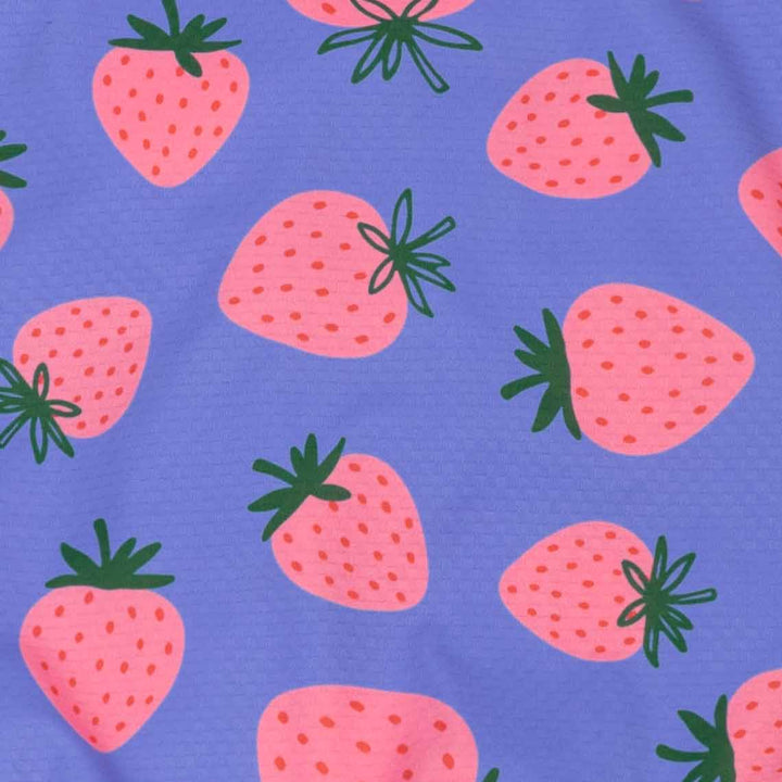Pattern of pink strawberries with green leaves on a blue background