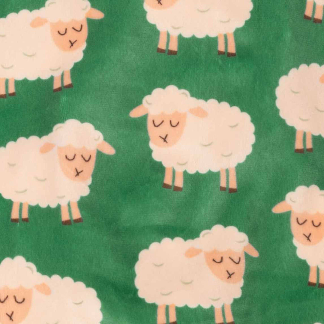 Green dog pajamas featuring playful white sheep print, made from soft polyester spandex.
