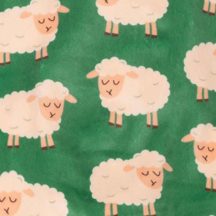 Green dog pajamas featuring playful white sheep print, made from soft polyester spandex.