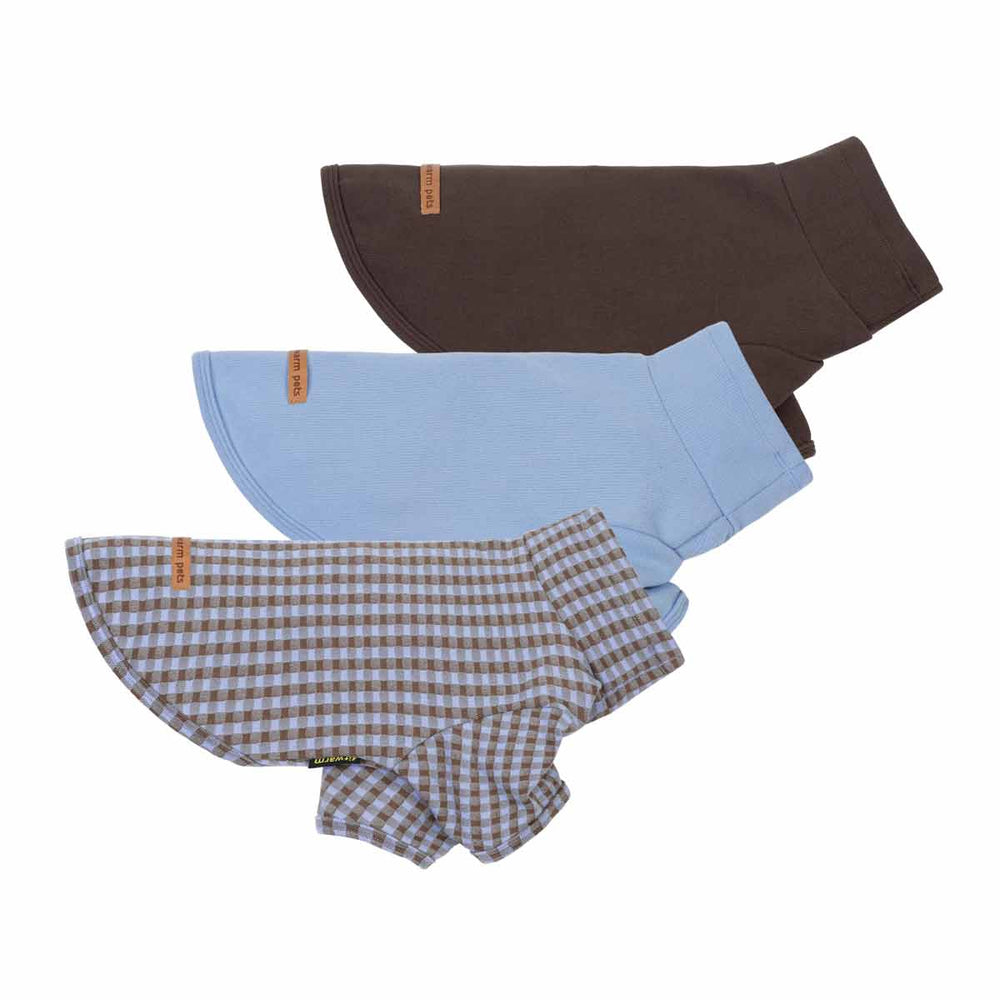 Three dog fleece sweaters in different colors and patterns are displayed on a clean white background including a dark brown solid-color, light blue solid-color and a brown and white gingham pattern