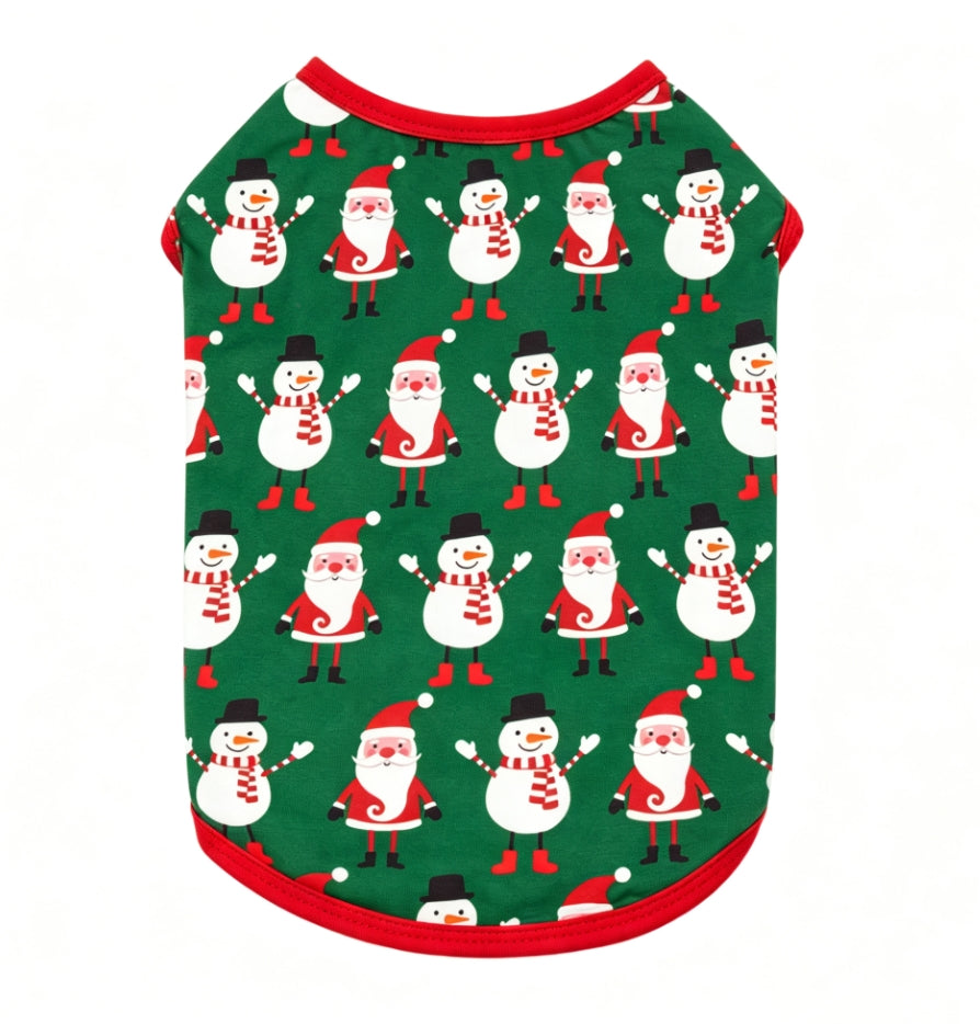 Green shirt for dogs with an all-over Christmas print featuring Santa Claus and snowmen, shown flat against a white background