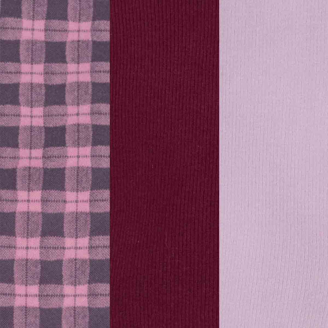 Three vertical fabric swatches side by side: a pink and gray plaid pattern on the left, a deep burgundy ribbed knit in the middle, and a light lavender solid on the right
