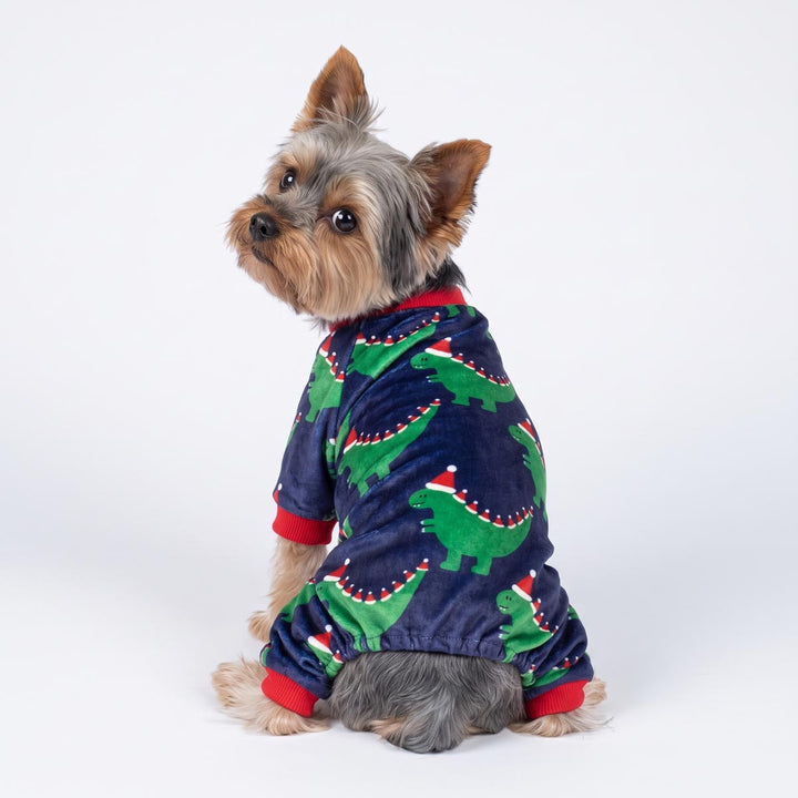Back view of Yorkie wearing a santa hat dinosaur Christmas pajamas for dogs